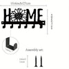 Black decorative metal wall-mounted key holder with seven hooks and assembly set