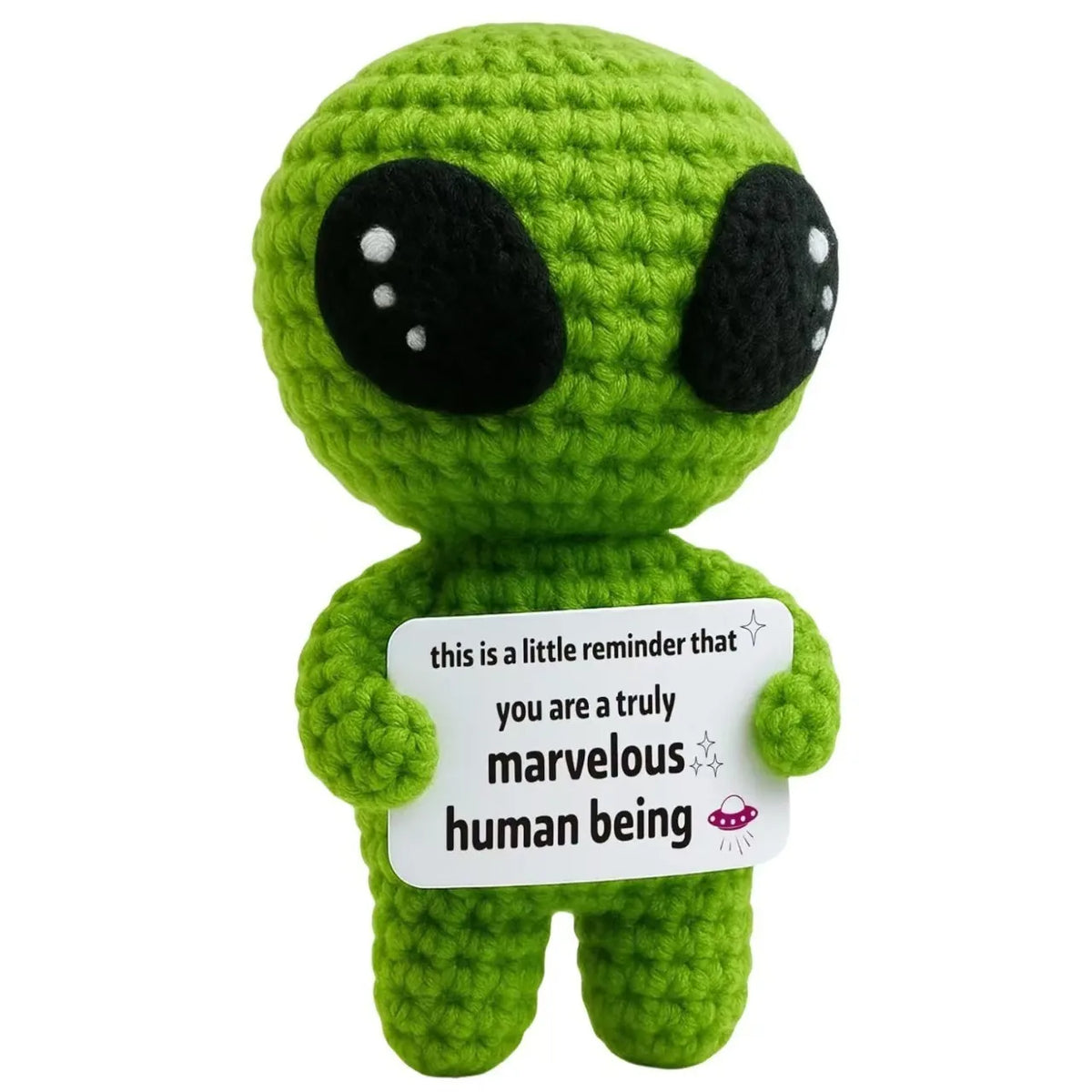 Handmade crochet green potato doll with large black eyes holding a card that says you are a truly marvelous human being