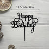 Elegant black acrylic birthday topper with the words Happy Birthday on a stick