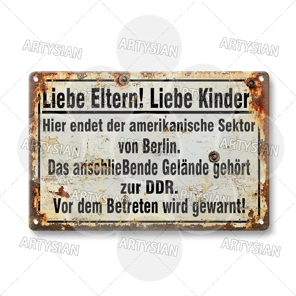 A weathered metal tin sign with German text on a distressed background.