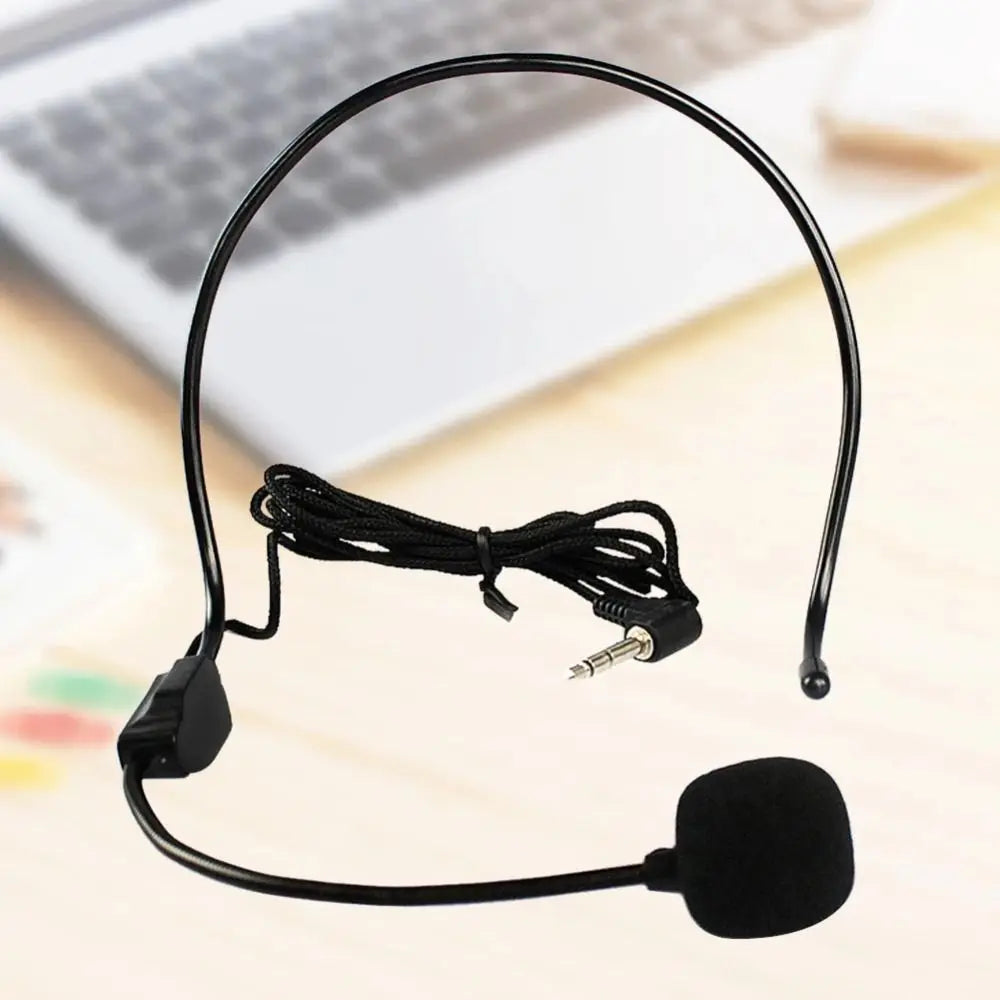 A black wired headset microphone with a flexible wire and an attached foam microphone element.