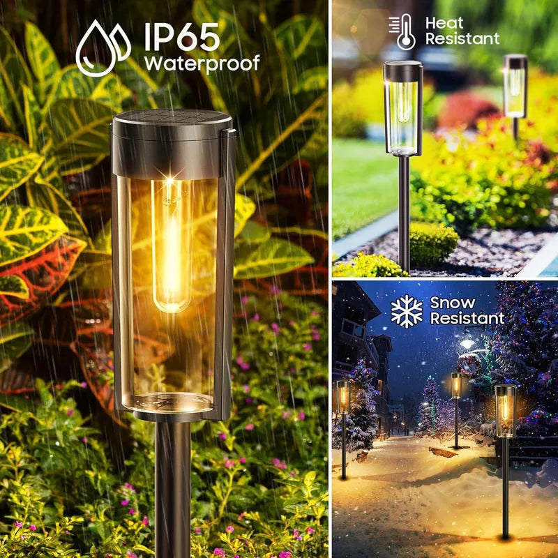 A close-up of an IP65 waterproof solar pathway light fixture illuminating a garden path.