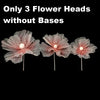 Three large, sheer pink velvet mesh flower heads without bases for wedding decoration.