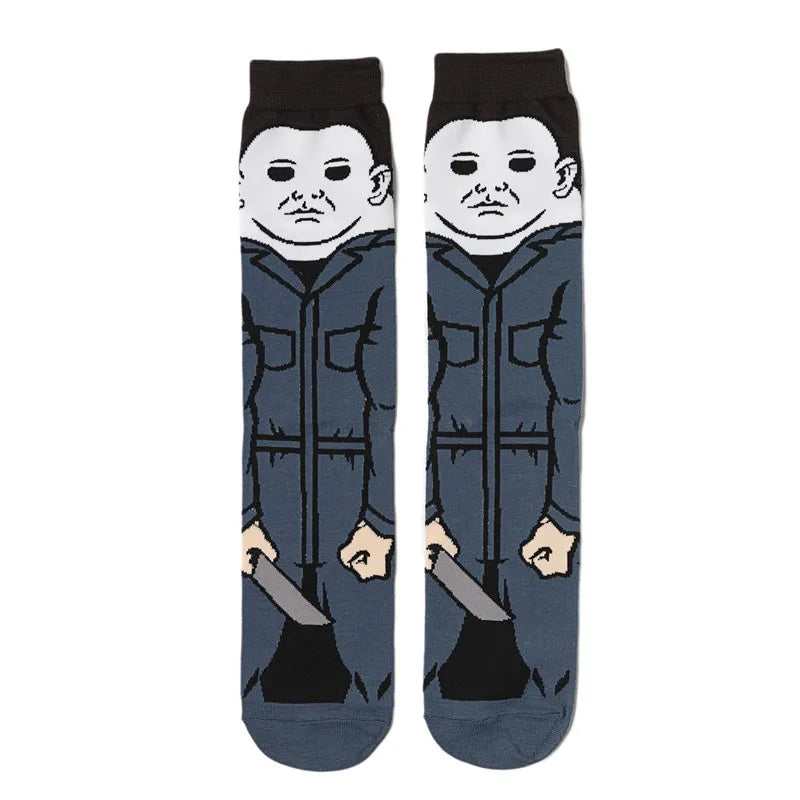 Pair of dark blue crew socks featuring a graphic print of a skull, alien, and tiger face.