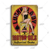 Vintage metal sign featuring a lady silhouette and text for Lucky Lady Motor Oils authorized dealer