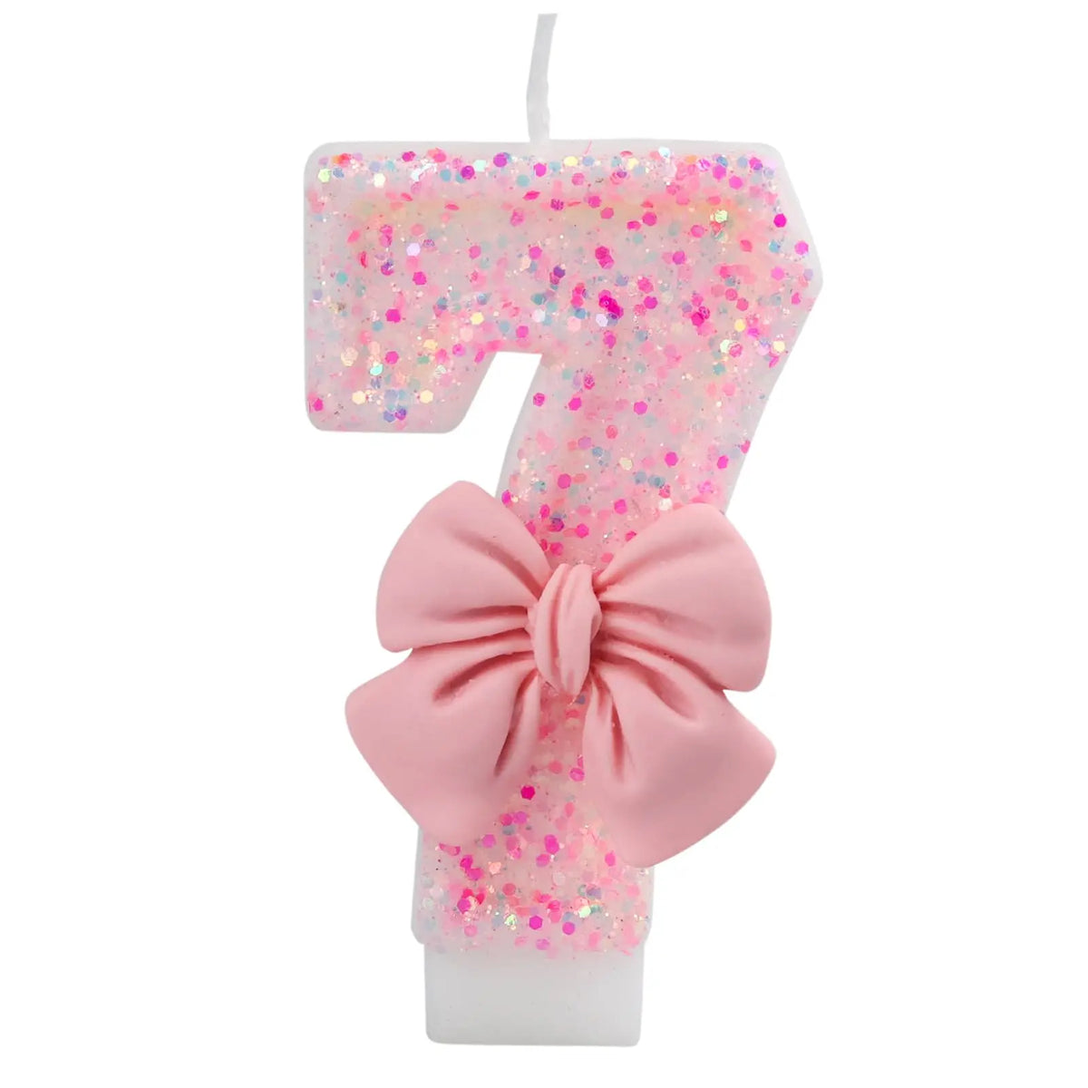Pink glitter number seven candle with a pink bow for birthday or anniversary