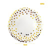 A plate of white ceramic with gold polka dots, shown against a white background.