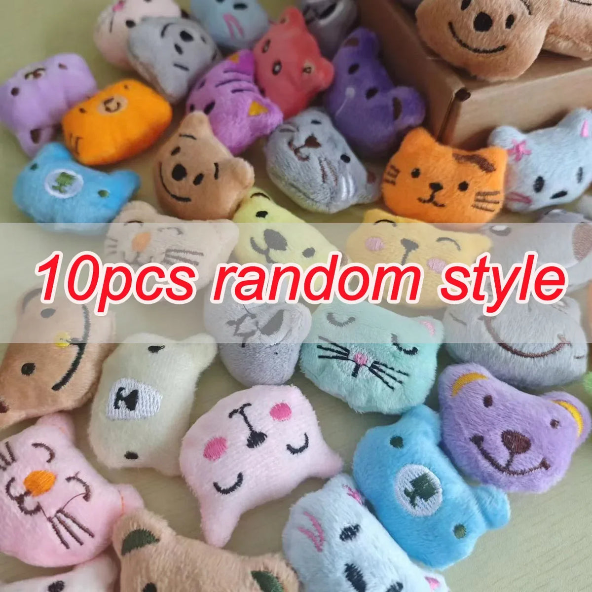 A collection of 10 random style mini animal plush dolls in various colors and textures.