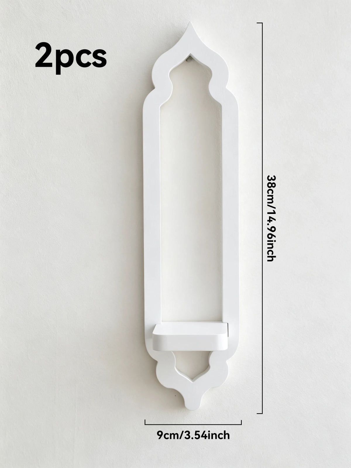 White wooden arch wall shelf with a decorative finial and hanging bracket