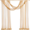 Elegant beige chiffon drapes hanging from a rod for wedding or event decor