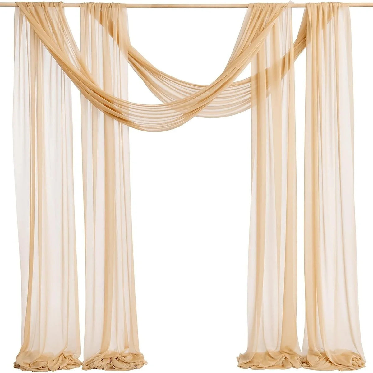 Elegant beige chiffon drapes hanging from a rod for wedding or event decor