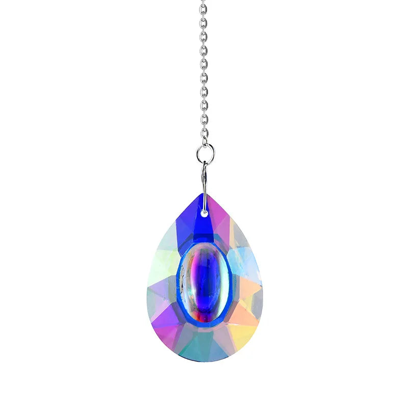 A hanging crystal suncatcher wind chime with a teardrop-shaped blue and iridescent glass pendant.