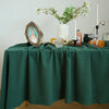 A dark green classic cotton rectangle tablecloth set for dining and events.