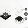 A DIY kit showing stacked clear and black acrylic layers with double-sided adhesive and magnet features.