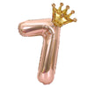Rose gold foil balloon shaped like the number 1 with a gold crown on top