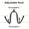 A black adjustable rack for organizing cowboy hats, showing its flexible design.