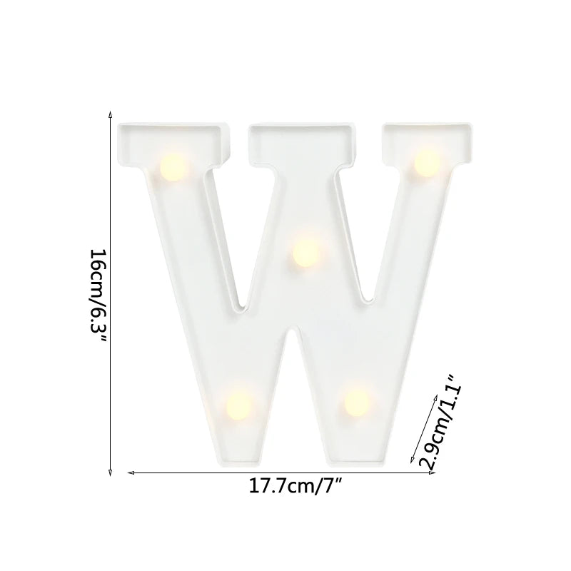 A white alphabet letter light displaying the letter W with warm white LED illumination.
