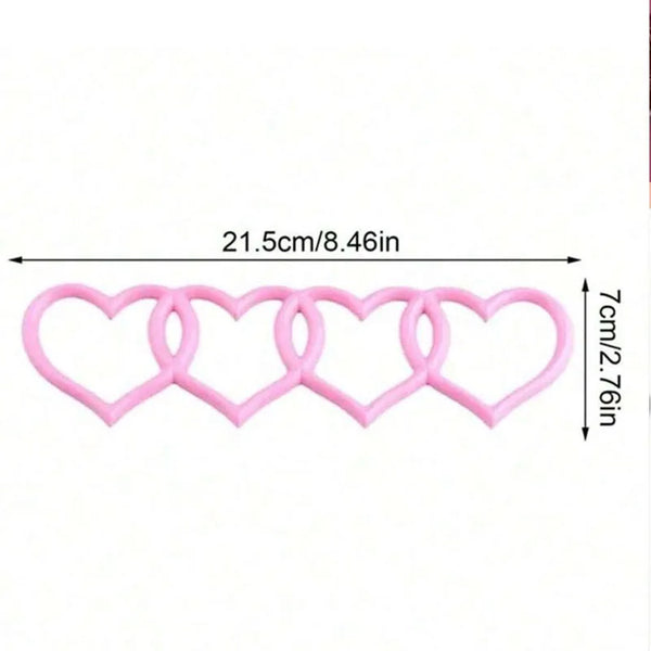 A set of pink 3D heart car badge stickers made of ABS plastic