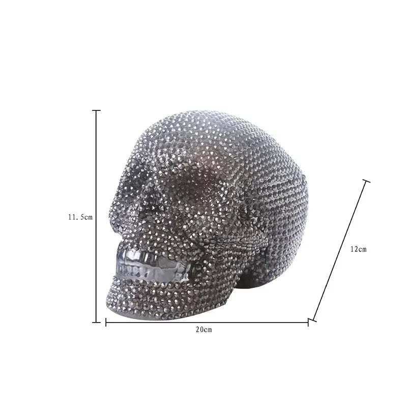 A realistic silver skull resin decorative sculpture shown from the side with dimensions.