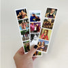 A hand holds a vertical strip of custom photo booth prints featuring various people and events.