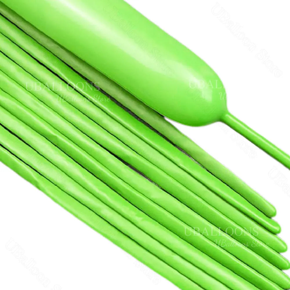 A close-up of a bundle of bright lime green magic twisting balloons.