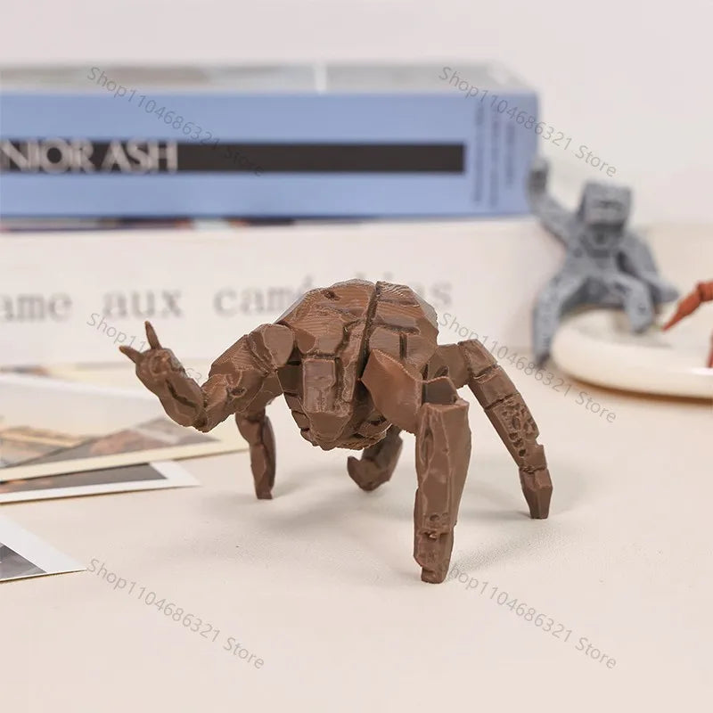 A brown collectible figurine of Rocky from Project Hail Mary is shown on a white surface.