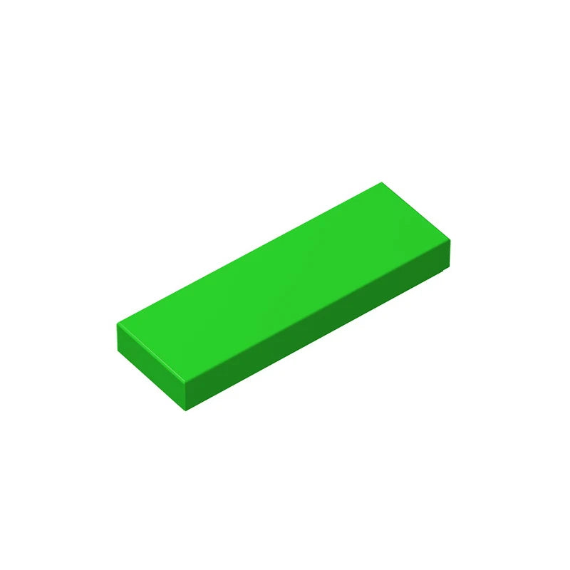 A rectangular, smooth green building brick.