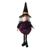 A witch ornament featuring a black pointed hat, a pale face, and a purple fuzzy body with black accents.