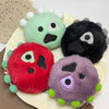 A collection of five pastel-colored plush keychains with clear photo card holders arranged on a light background.