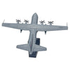 A gray 1:200 scale diecast model of a C-130 Hercules aircraft in flight.