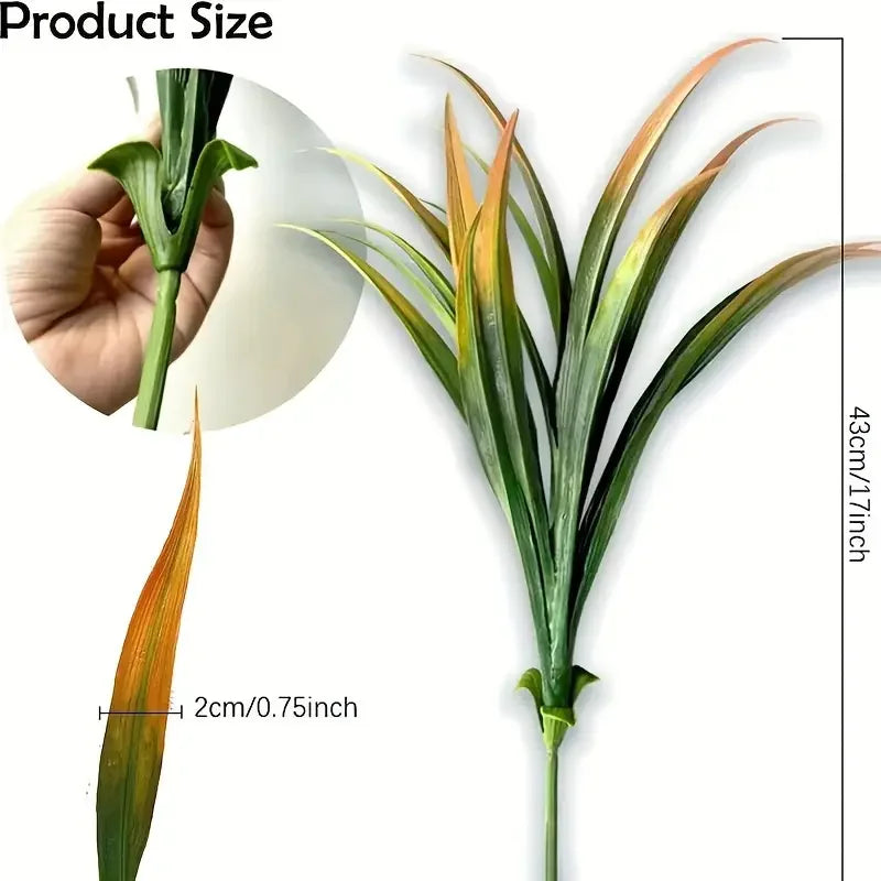 A close-up view of artificial tall grass and tropical flowers showing their size and texture.