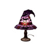 A witch hat night light featuring a stained glass effect design with purple and black patterns.