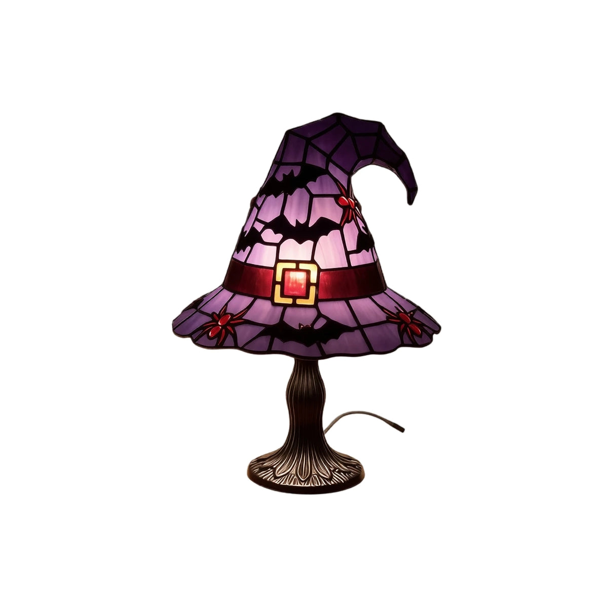 A witch hat night light featuring a stained glass effect design with purple and black patterns.
