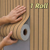 A hand is unwrapping a roll of 3D wood grain self-adhesive wallpaper, showing the texture and packaging.