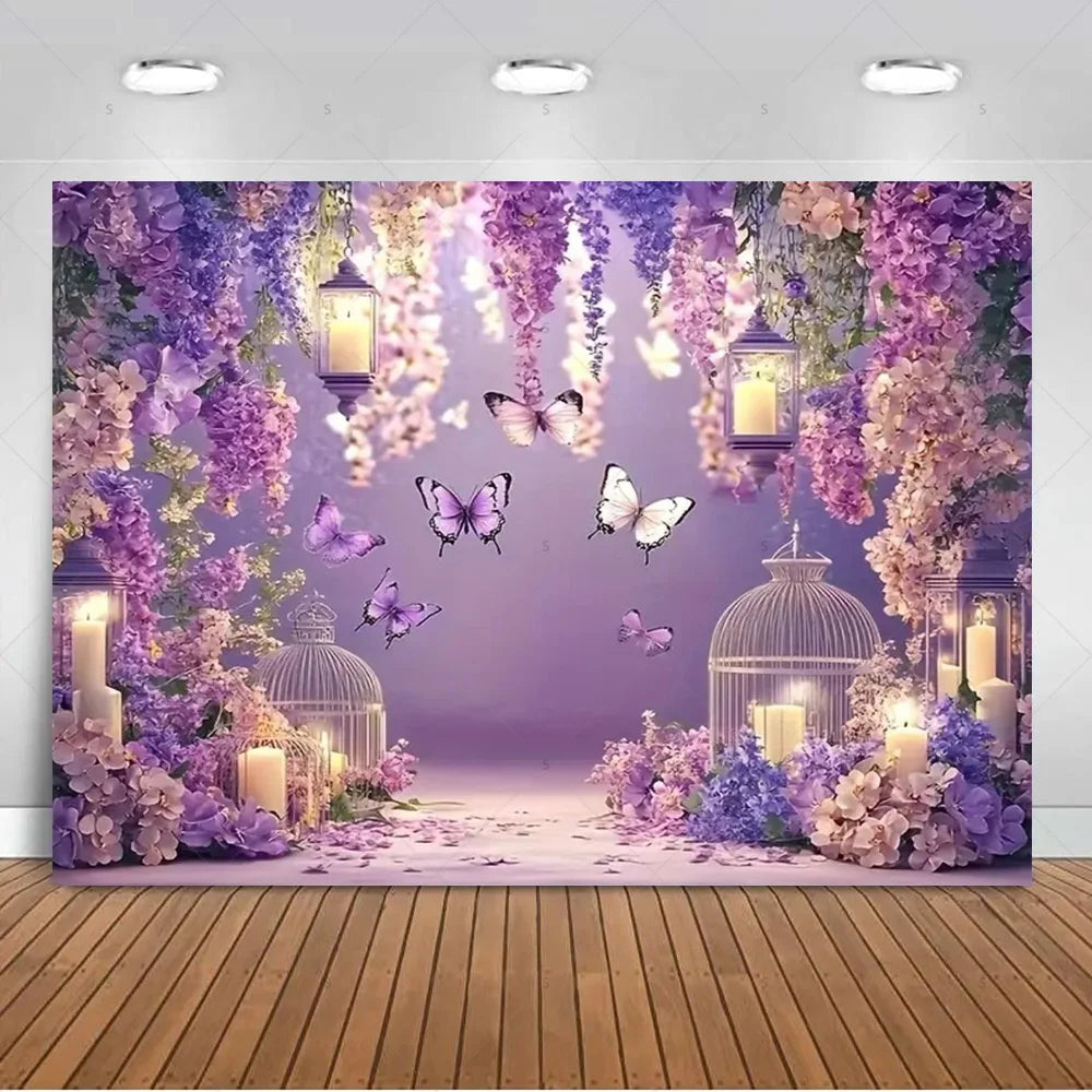 A dreamy purple butterfly photo backdrop featuring hanging lanterns, lush purple and pink floral elements, and a wooden floor