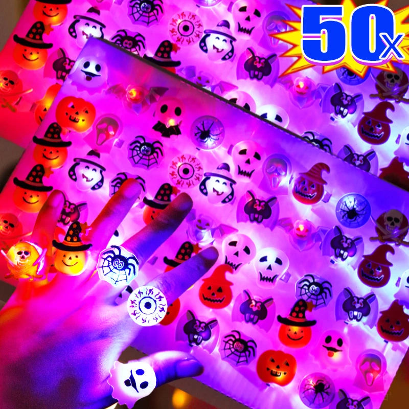 A hand holds a sheet of glow rings featuring Halloween themed skulls, bats, and pumpkins under purple light.