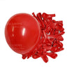 A cluster of deep burgundy latex balloons is shown next to a large red balloon.