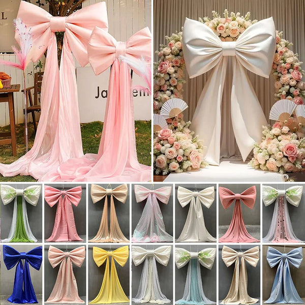 Collection de grands nœuds en satin avec de longues draperies de tulle dans diverses nuances de rose, blanc et beige pour la 