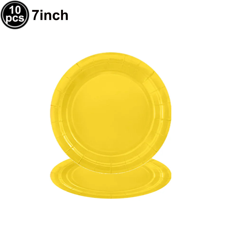 A stack of ten 7-inch yellow disposable paper plates.