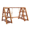 A wooden dessert display stand with three tiers, featuring a rustic rope handle for serving.