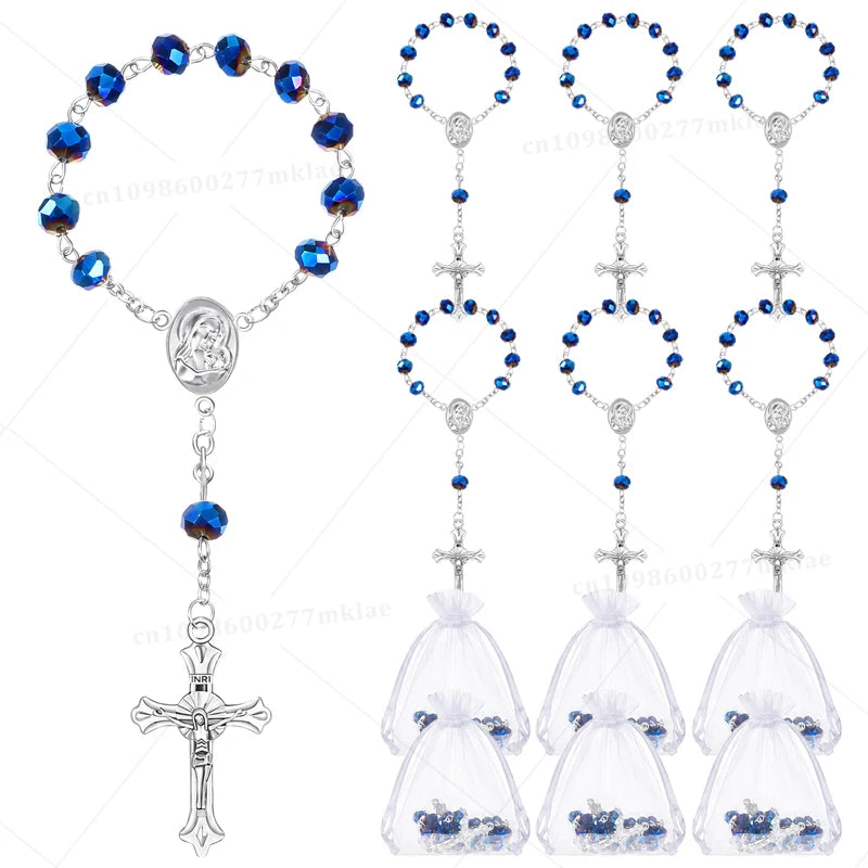 Mini baptism rosary favors with cross in assorted styles featuring blue beads and white fabric bags