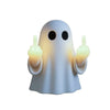 A white ghost figurine lamp with a warm glow making a pointing gesture.