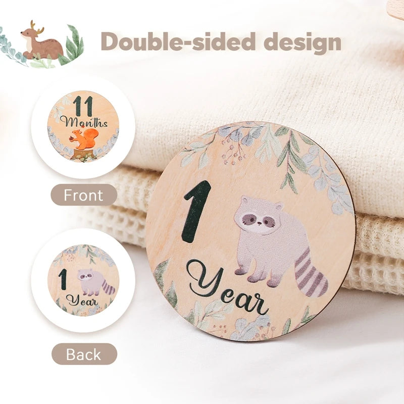 A wooden baby milestone card showing the number 1 and the word year with a cute panda illustration.
