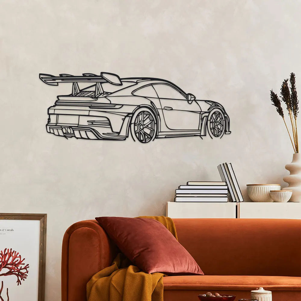 Black sports car metal wall art featuring a sleek modern car silhouette on a light gray wall.