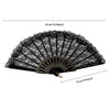 Black and white vintage lace folding fan with a decorative edge.
