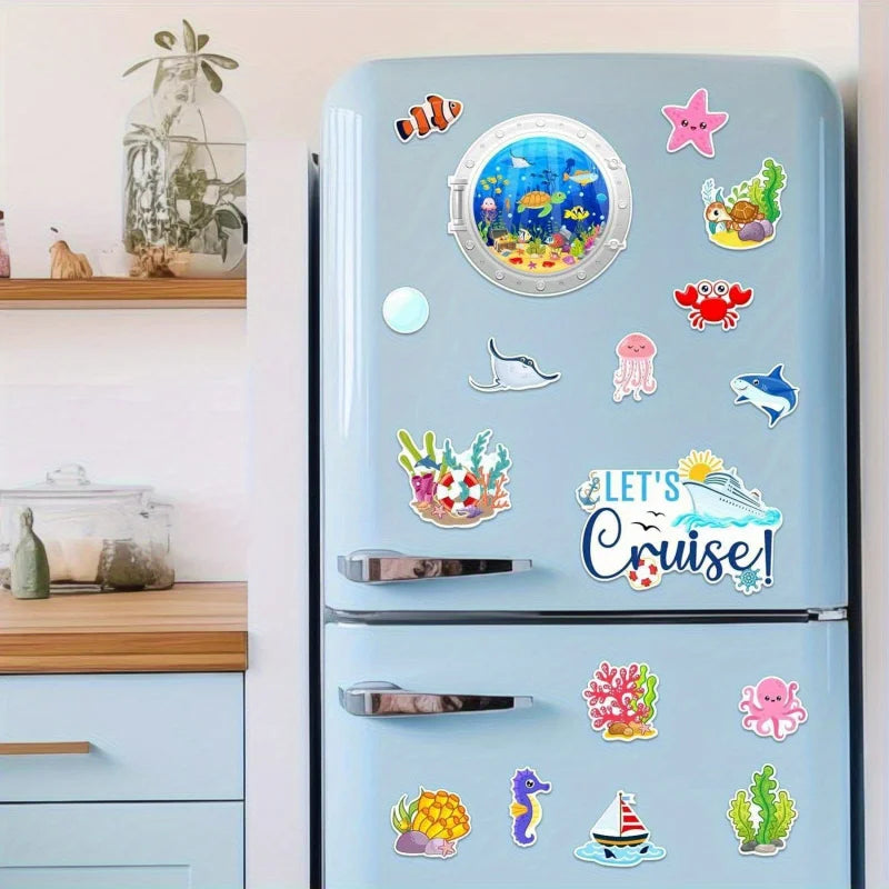 A blue refrigerator decorated with various colorful ocean and sea life magnets.
