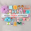 A variety pack of 35 mini pet shop accessories including silicone toys, jewelry, and small items on a gray background.