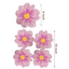 Two pink daisy flower napkins, one 5 inches tall and one 10 inches tall.