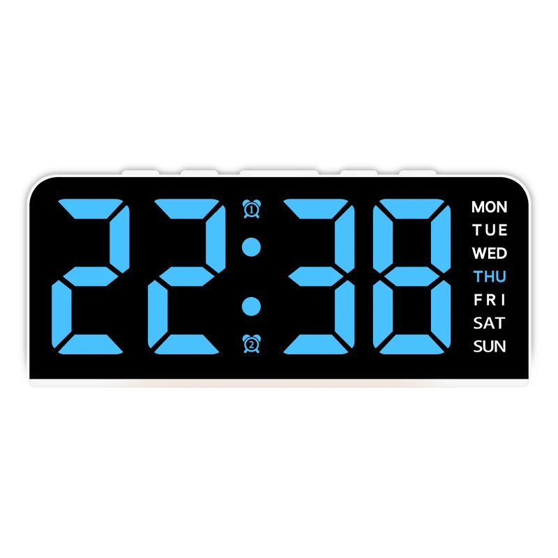 A black digital alarm clock displaying 22:38 with a mood light feature.