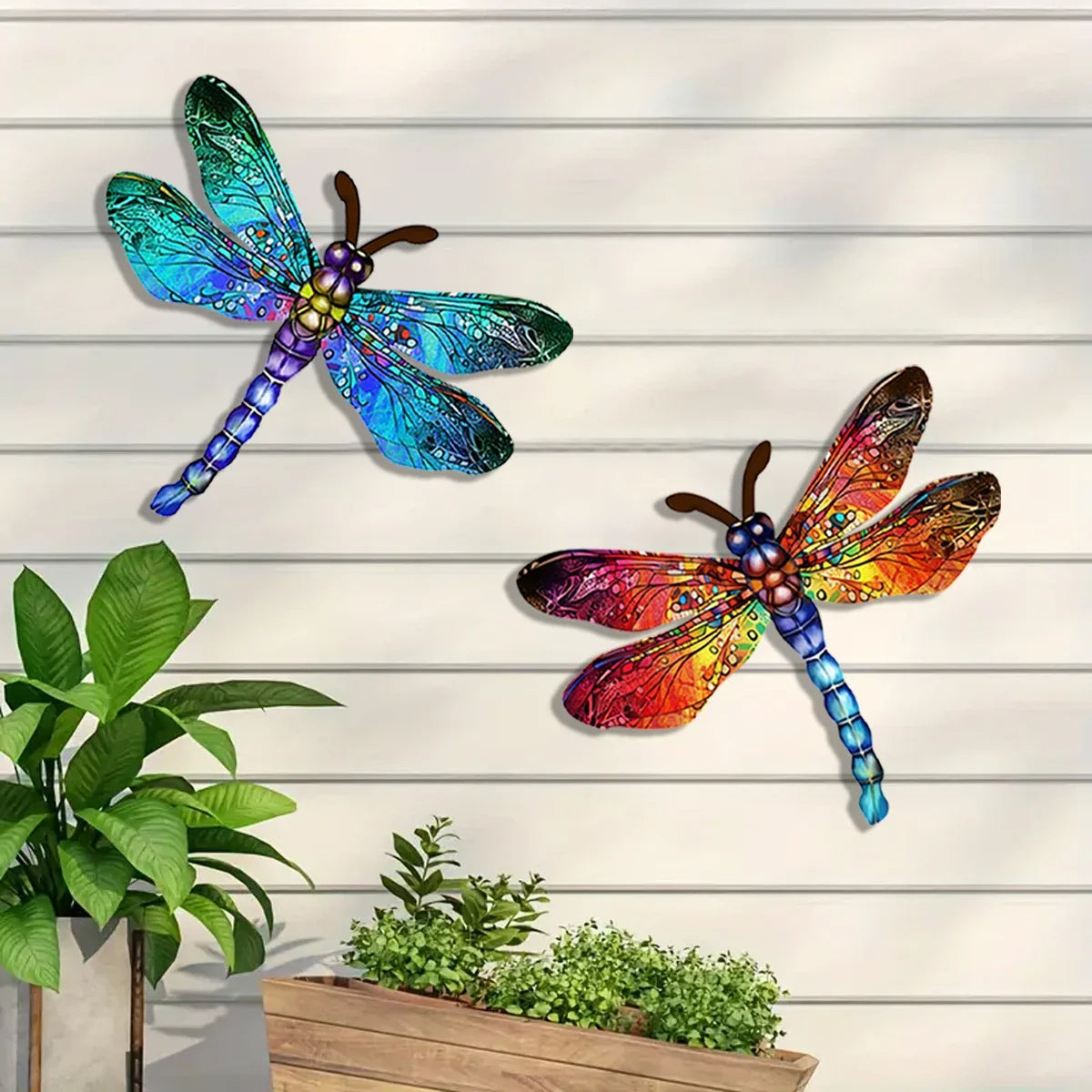 Vintage dragonfly wall art sculpture featuring iridescent blue and purple wings mounted on a white wooden panel.
